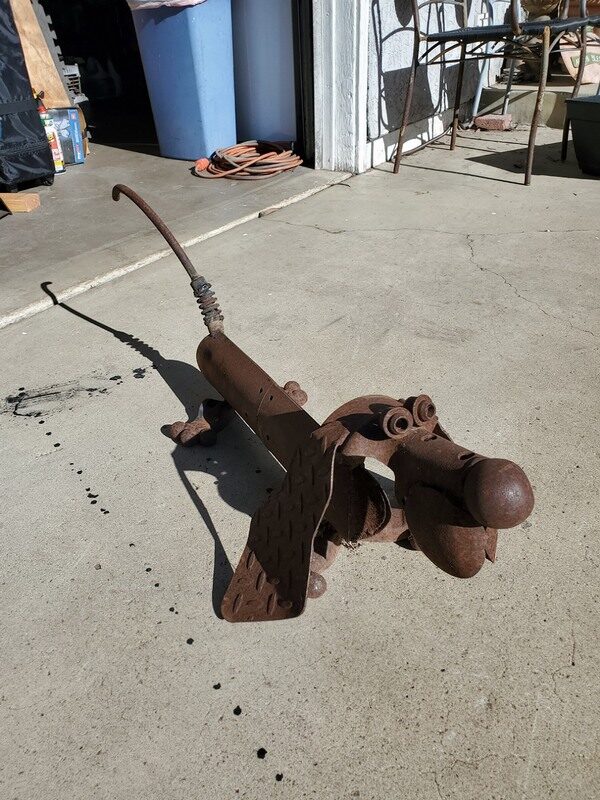 Spot the scrap-metal dog sculpture, repaired and back on all fours