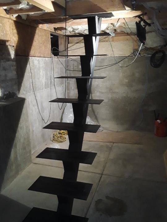 Custom fabricated steel spiral staircase
